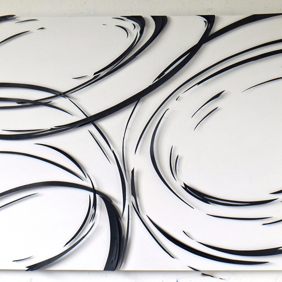 Andreas Kocks creates meticulously cut paper installations that images that evoke painterly marks and strokes.