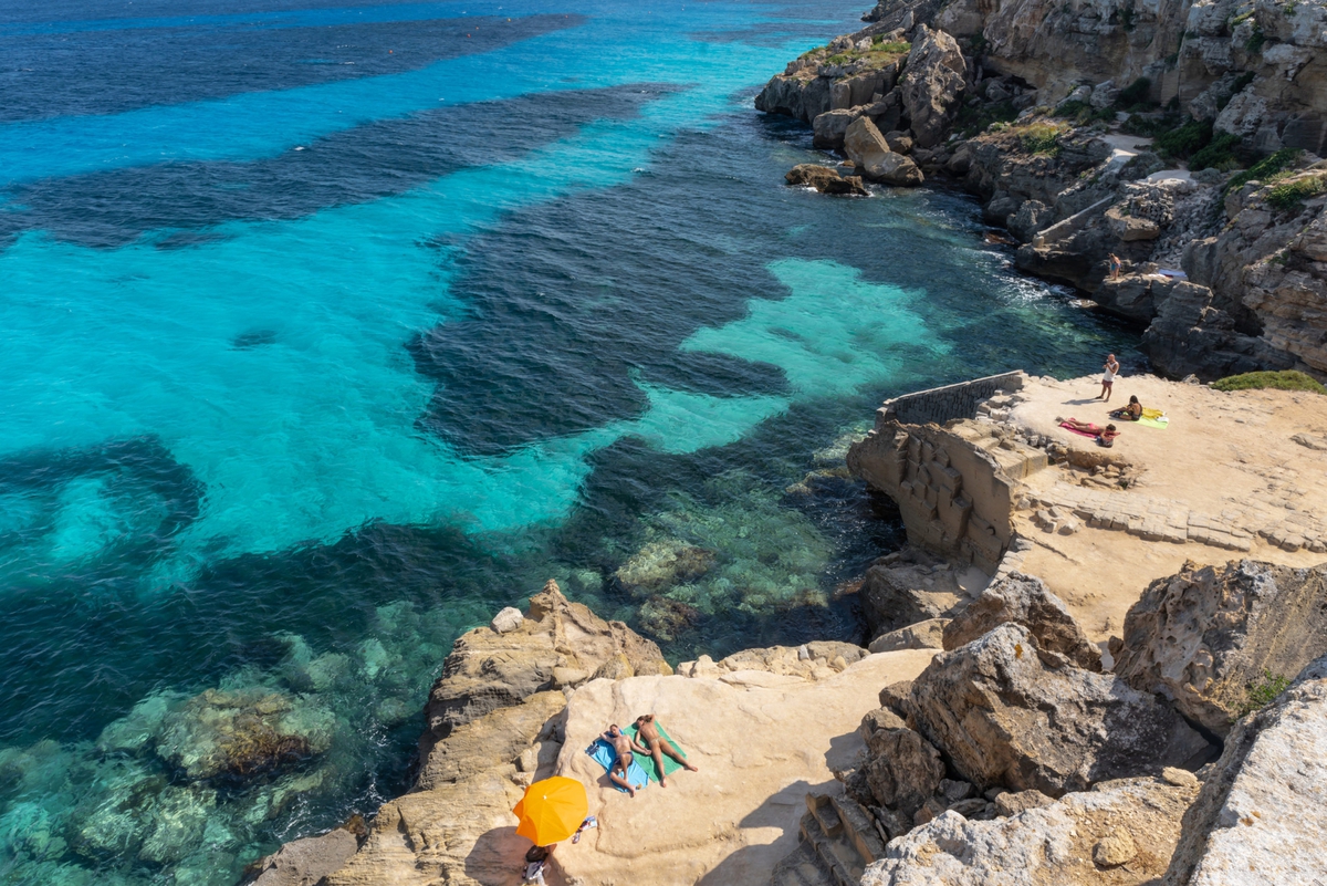 Deb Achak: Cala Rossa, Favignana Sicily, 2018, Digital archival print, 20x30, 30x45, 40x60 inches