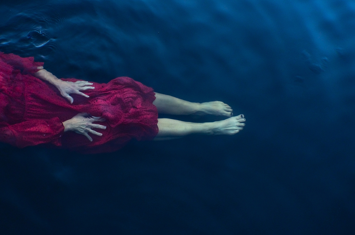 Deb Achak: The Red Dress, Goss Lake, 2019, Digital archival pigment print, 20 x 30, 30 x 45, 40 x 60 inches