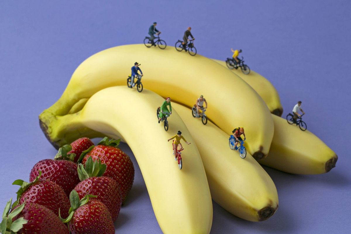 Christopher Boffoli: Banana Racers, 2015, Archival pigment ink print on metallic paper