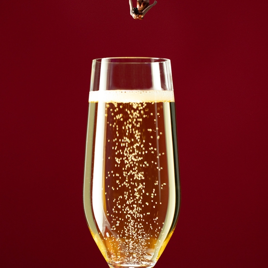 Christopher Boffoli: Champagne Swan Dive, 2022, Archival pigment ink print on metallic paper, Available in various sizes