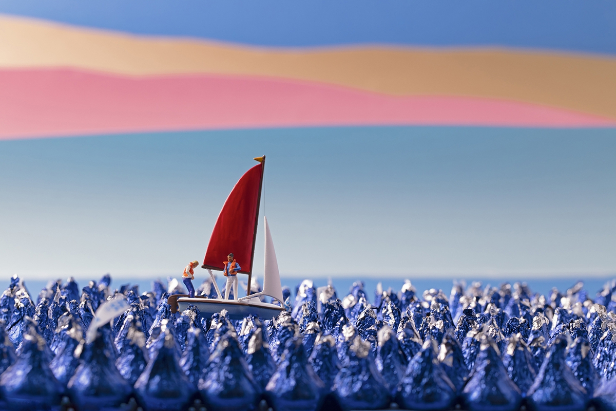 Christopher Boffoli: Chocolate Kisses Sail, 2020, Archival pigment print on metallic paper, 24 x 36 inches and other various sizes