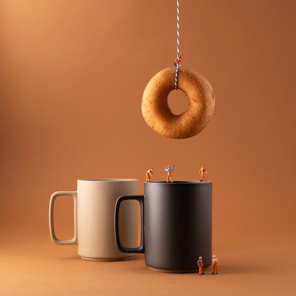 Christopher Boffoli: Doughnut Dunkers, 2023, Archival pigment ink print on metallic paper, Available in various sizes