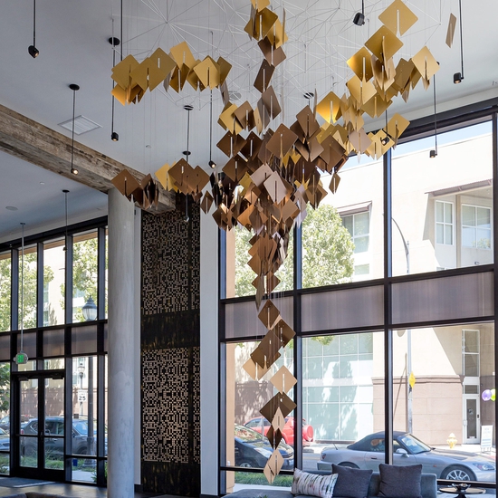 Brian Brush creates large scale interactive installation artworks through the use of light, metals and technology