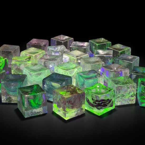 An installation view of Water Within, a collection of uranium glass cubes, 2017