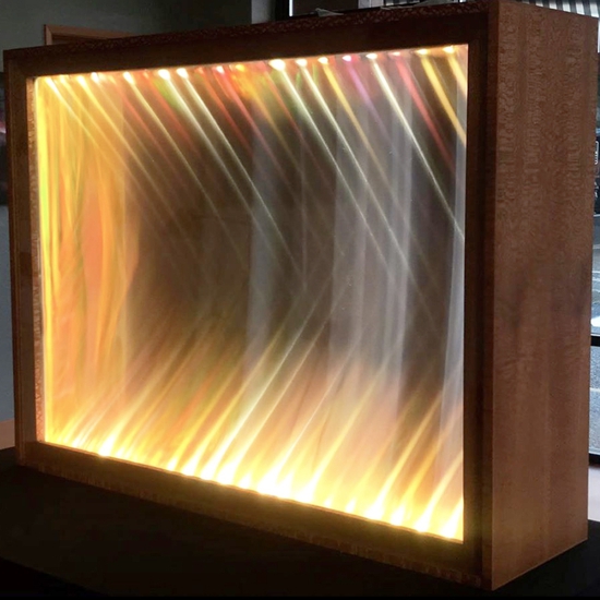 Maja Petric: Reduced Landscape Sun, 2020, LED light, lacewood, custom optical filters, 38 x 50 × 14 inches