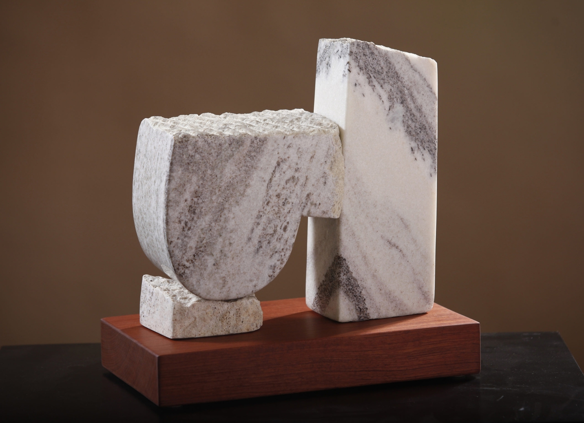 Julie Speidel creates totemic sculptures from steel, bronze, marble, exploring the geometric language that appears in cultures from around the world.