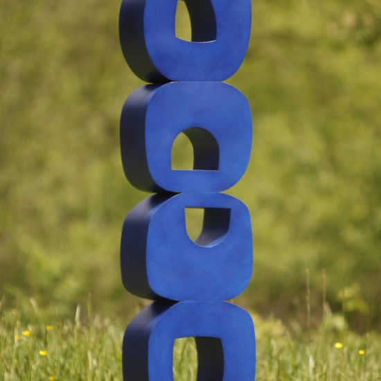 Julie Speidel creates totemic sculptures from steel, bronze, marble, exploring the geometric language that appears in cultures from around the world.