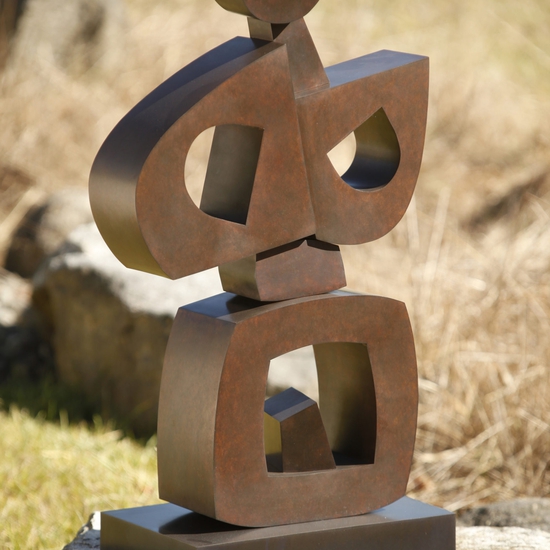 Julie Speidel creates totemic sculptures from steel, bronze, marble, exploring the geometric language that appears in cultures from around the world.