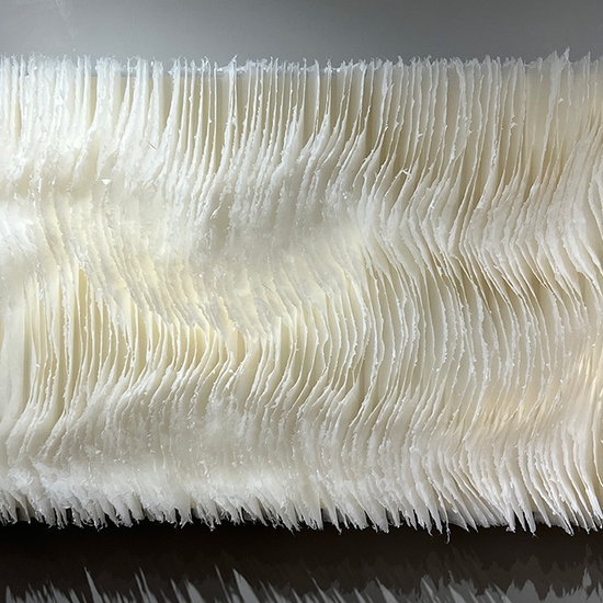 Kandis Susol: A Running Stream, The Cold Mountain Path, 2023, Artist made paper encaustic sculpture, 32 x 62 x 5 inches