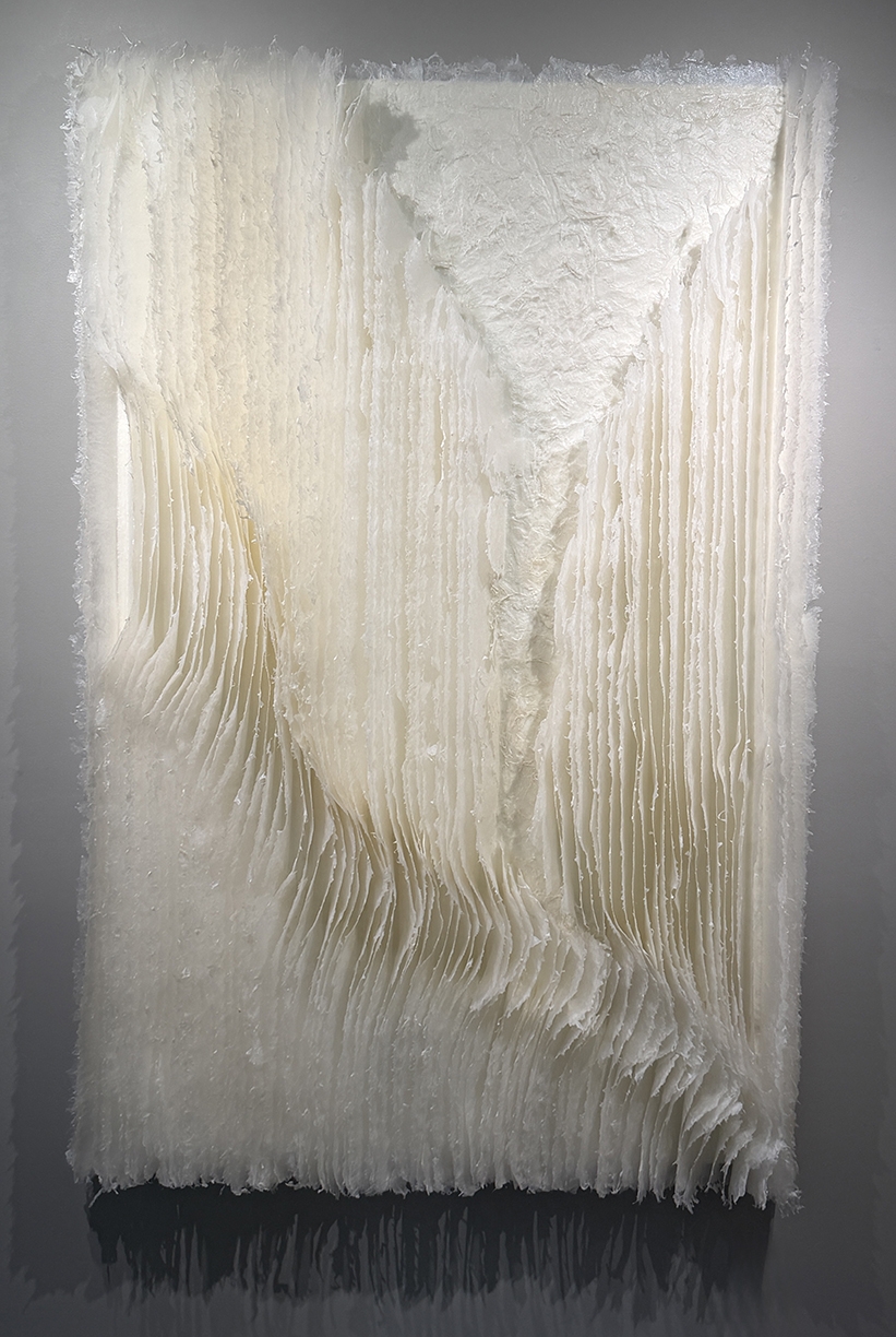 Kandis Susol, Emerging Light, 2026, Encaustic sculpture, 62 x 42 x 5 inches