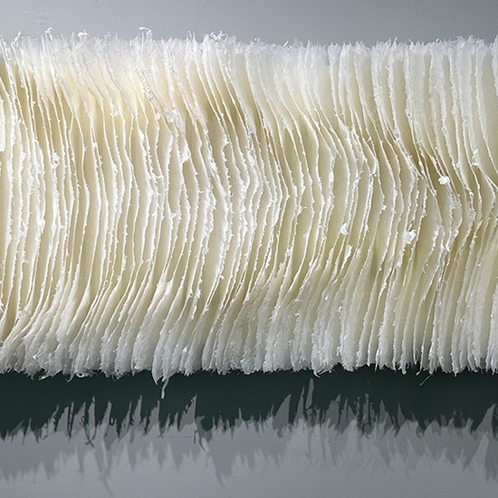 Kandis Susol, Into The Wind, 2025, Encaustic sculpture, 22 x 62 x 5 inches