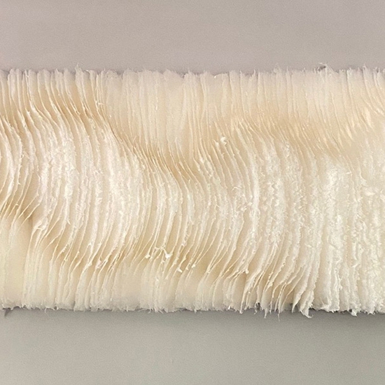 Kandis Susol: Streams Draw Music, 2021, Artist made paper encaustic sculpture, 26 x 75 x 5 inches