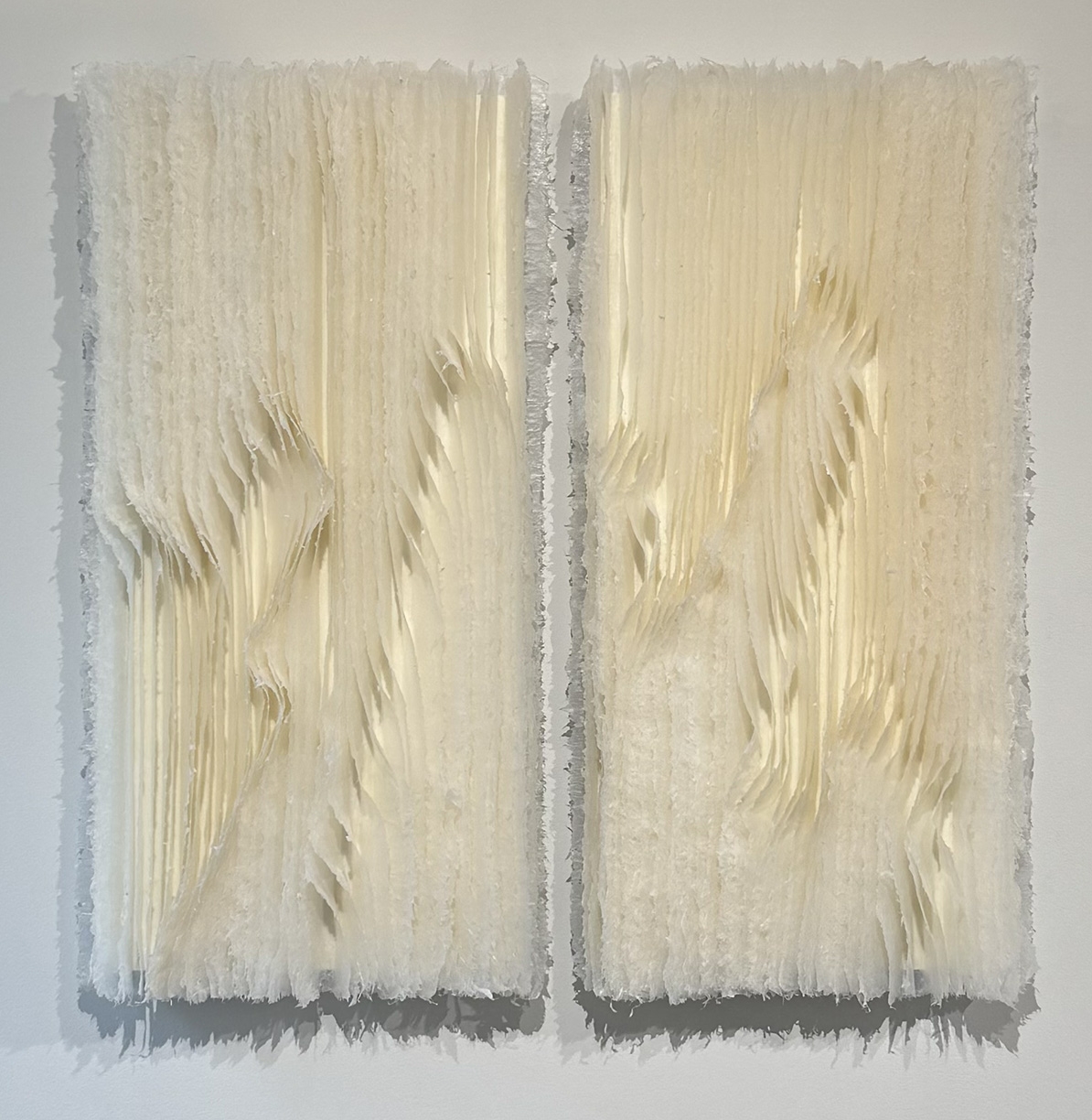 Kandis Susol, Two Volumes, 2025, Encaustic sculpture, 48 x 48 x 5 inches