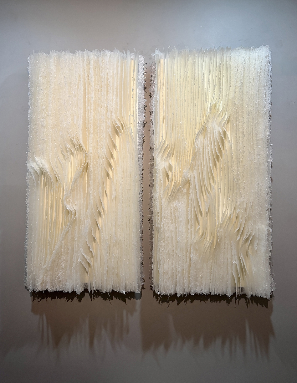 Kandis Susol, Two Volumes, 2025, Encaustic sculpture, 48 x 48 x 5 inches