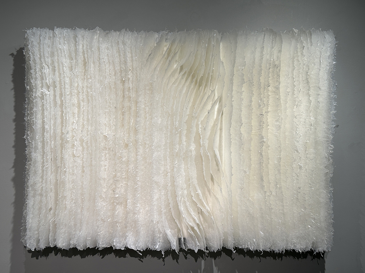 Kandis Susol, A Thousand Miles the Same Wind Blows, 2024, Encaustic Sculpture, 26 x 38 x 5 inches